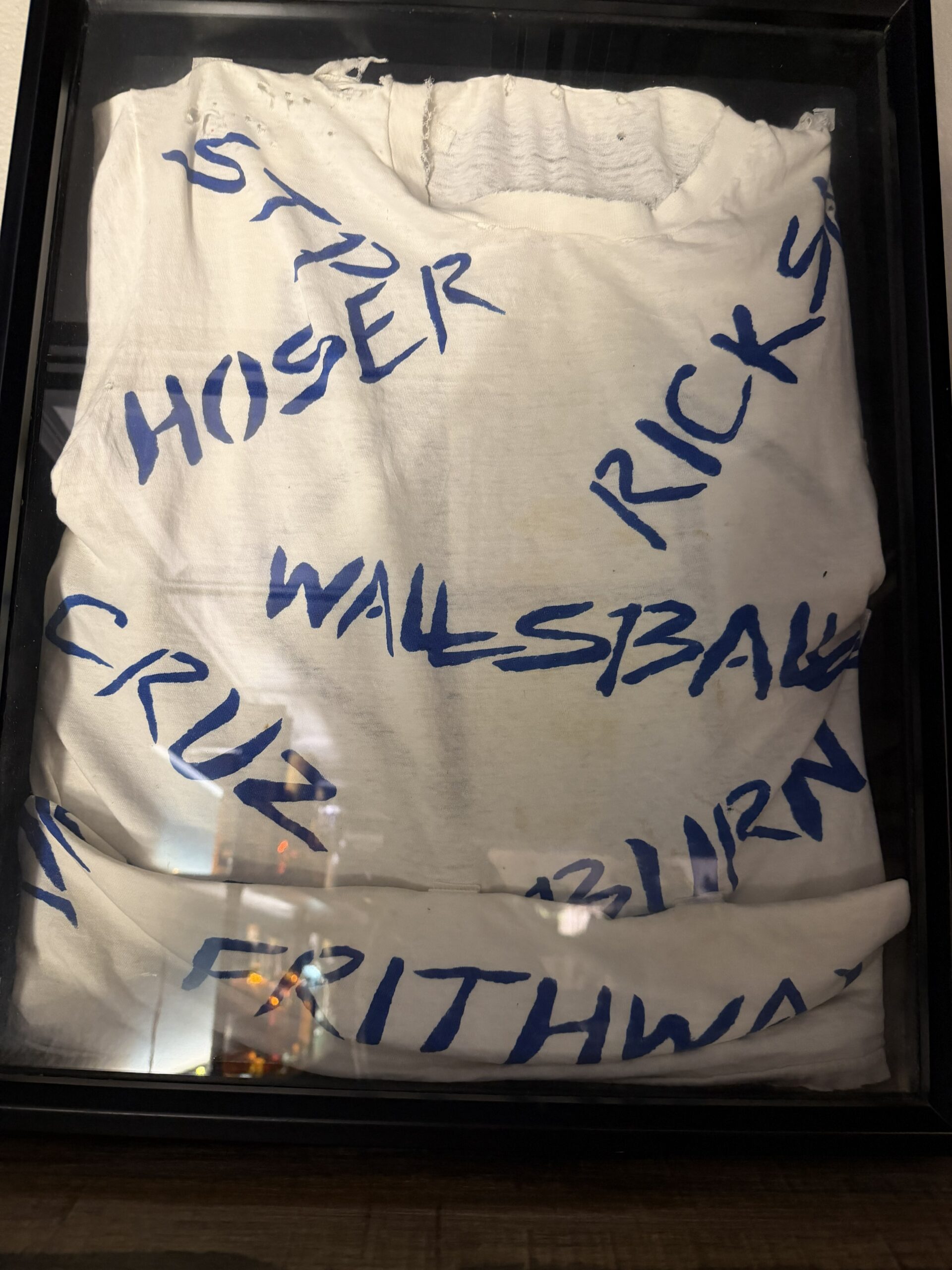 Original DHD Shirt — framed, with member names written in marker, circa 1987